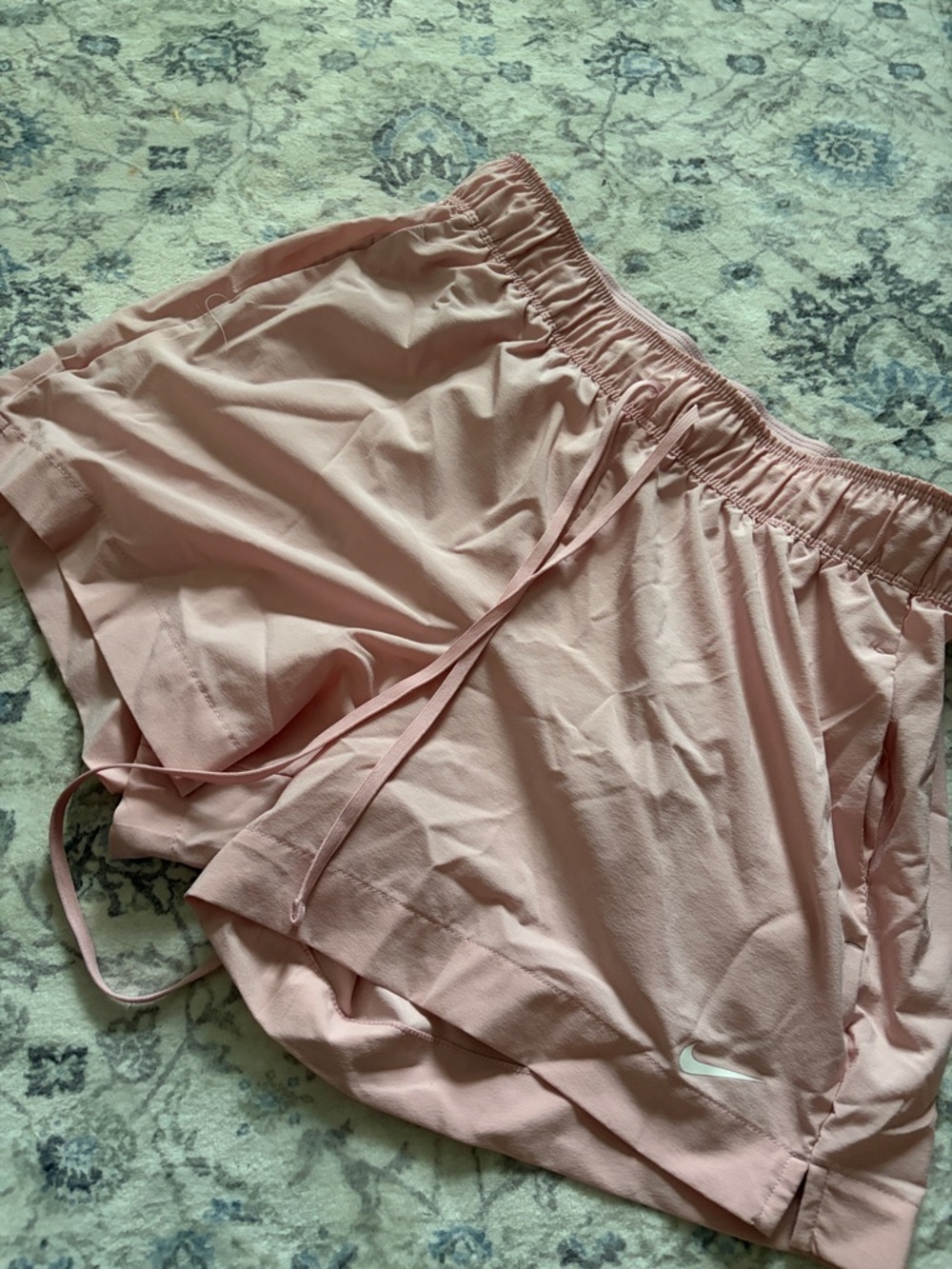 Nike Light Pink Women's Athletic Shorts with White Swoosh